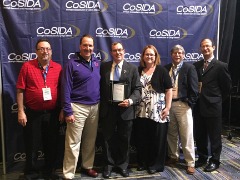 Timm with his former Northwest Conference colleagues after the 2017 Warren Berg Award presentation.
